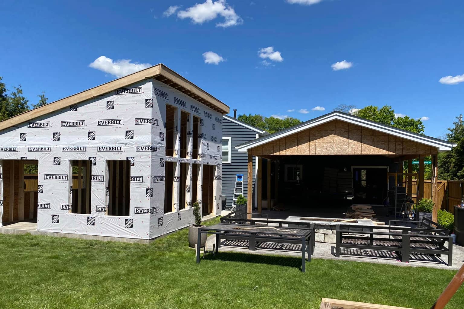 a porch and out building under construction